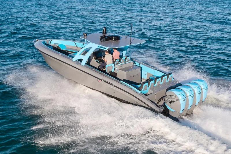 Do Better Yacht Photos Pics 2021 Midnight Express 37 Open boat cruising on blue ocean waters.