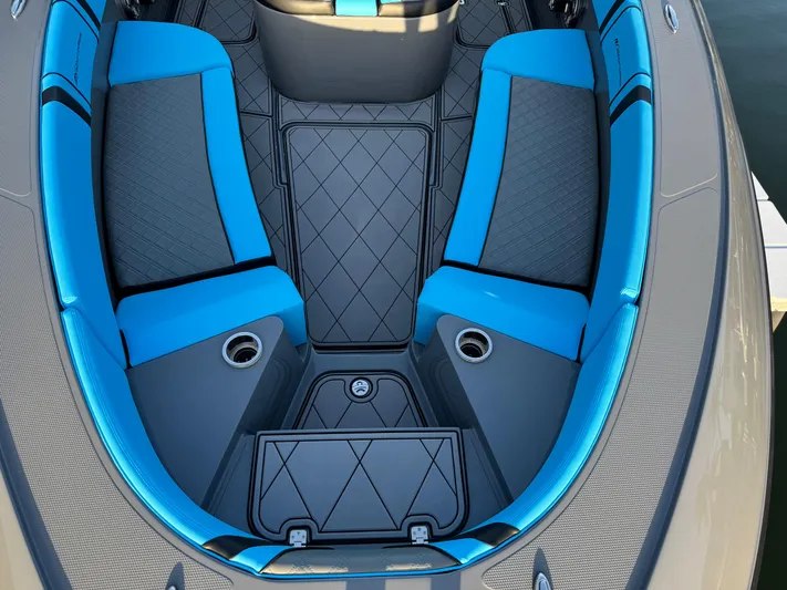 Do Better Yacht Photos Pics Interior view of 2021 Midnight Express 37 Open boat with blue and gray seating.