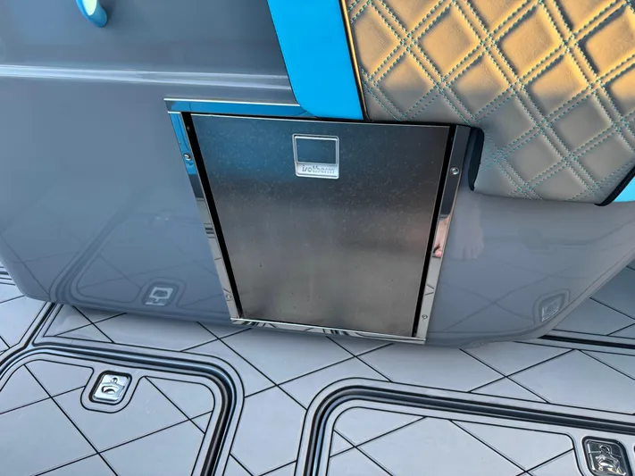 Do Better Yacht Photos Pics 2021 Midnight Express 37 Open boat interior with quilted upholstery and stainless steel compartment.