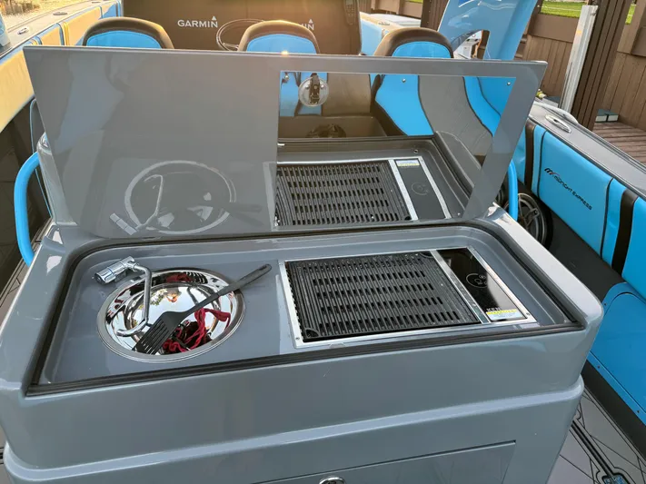 Do Better Yacht Photos Pics 2021 Midnight Express 37 Open boat with modern grill and sink setup.