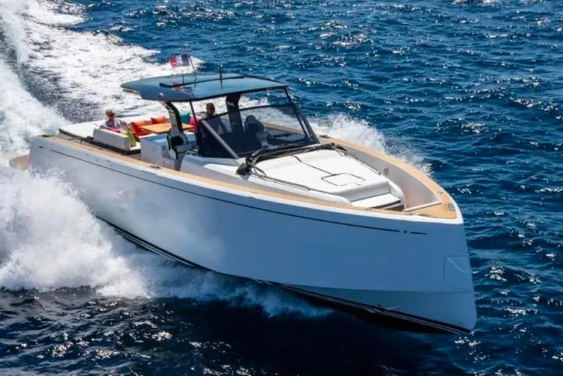  Yacht Photos Pics 2023 Pardo Yachts 50 cruising on open sea, sleek design, luxury motorboat.