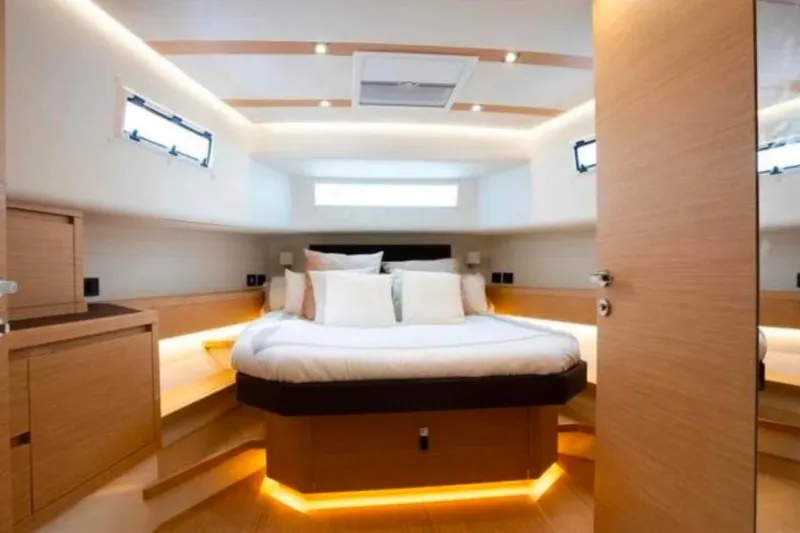  Yacht Photos Pics Luxurious cabin interior of 2023 Pardo Yachts 50, featuring modern design and ambient lighting.