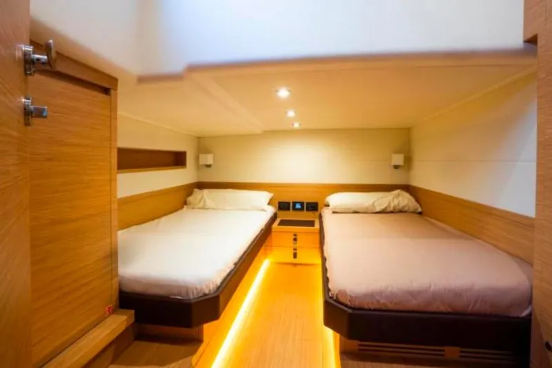  Yacht Photos Pics Luxurious cabin interior of 2023 Pardo Yachts 50 with twin beds and modern lighting.