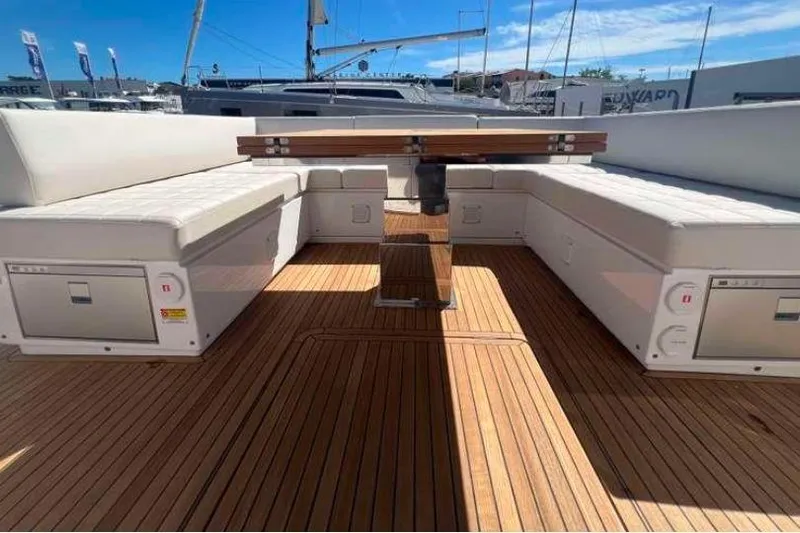  Yacht Photos Pics 2023 Pardo Yachts 50 deck with white seating and wooden flooring.