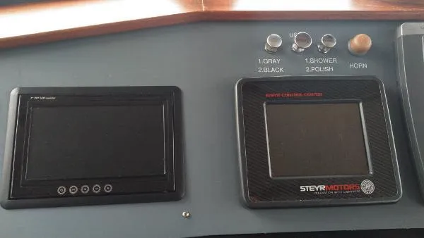 Moondance Yacht Photos Pics Control panel of a 2007 Custom Rockport Steel Trawler MY with Steyr Motors display.