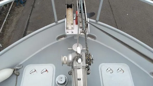 Moondance Yacht Photos Pics Bow of 2007 Custom Rockport Steel Trawler MY with anchor winch and deck hatches.