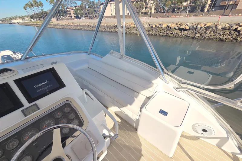  Yacht Photos Pics 2006 Hatteras 50 Convertible yacht cockpit with Garmin navigation system.