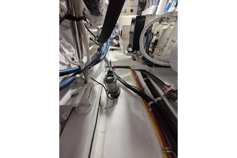  Yacht Photos Pics Engine room of 2006 Hatteras 50 Convertible yacht with visible wiring and components.