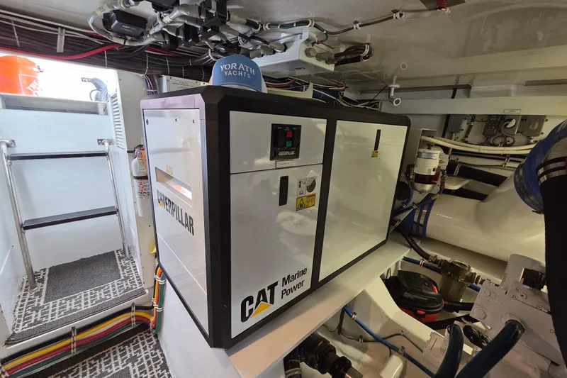  Yacht Photos Pics Engine room of 2006 Hatteras 50 Convertible with Caterpillar marine power unit.