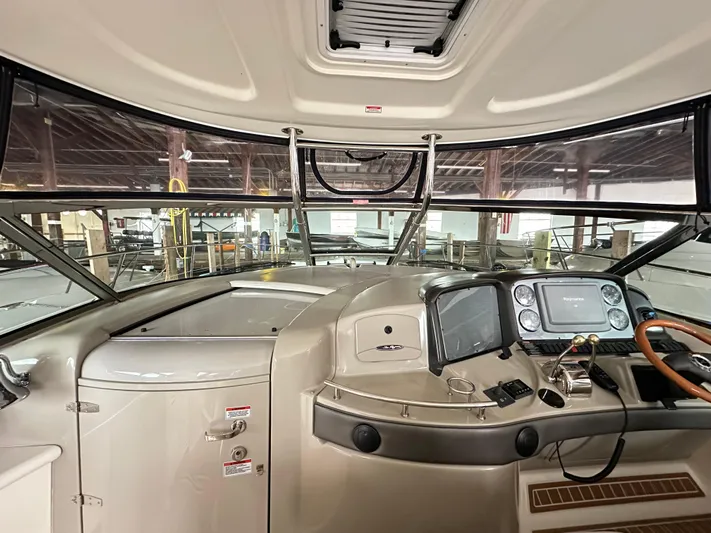  Yacht Photos Pics 2007 Sea Ray 44 Sundancer helm with modern navigation equipment and sleek design.