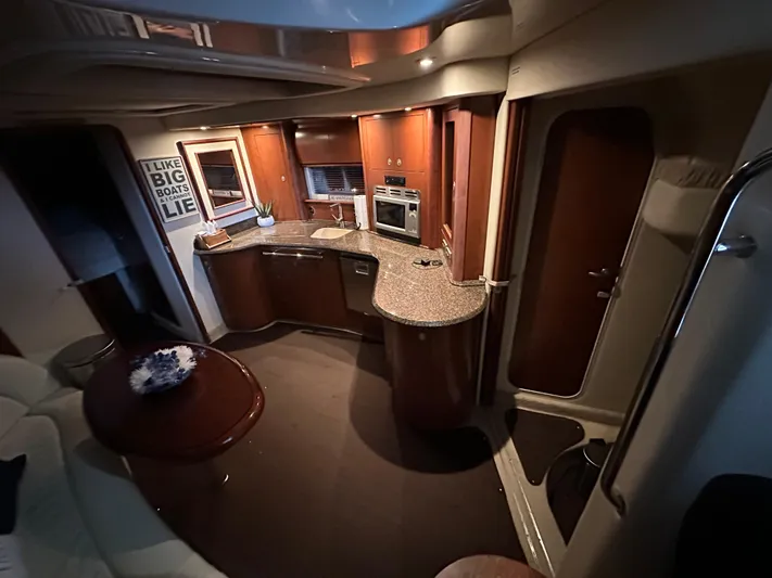  Yacht Photos Pics Luxurious 2007 Sea Ray 44 Sundancer yacht interior with modern kitchen and elegant design.