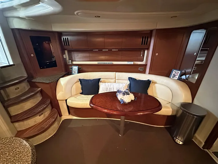  Yacht Photos Pics Luxurious 2007 Sea Ray 44 Sundancer interior with elegant seating and wooden accents.