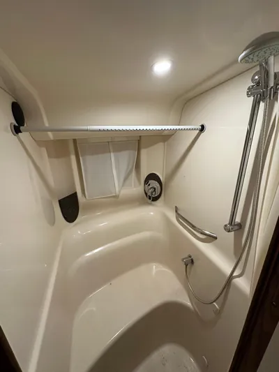  Yacht Photos Pics Shower area in 2007 Sea Ray 44 Sundancer yacht, featuring modern fixtures and lighting.