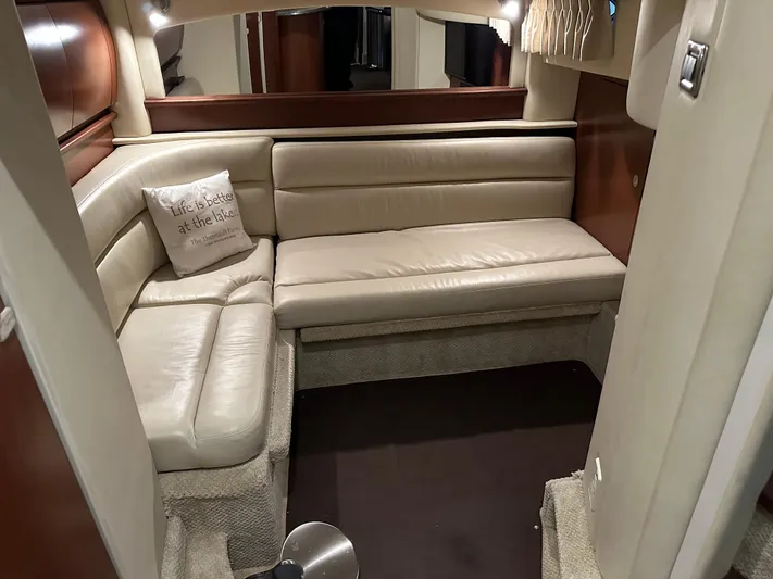  Yacht Photos Pics Luxurious interior of 2007 Sea Ray 44 Sundancer with beige leather seating.