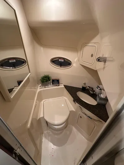  Yacht Photos Pics Luxurious bathroom in 2007 Sea Ray 44 Sundancer yacht with modern amenities.