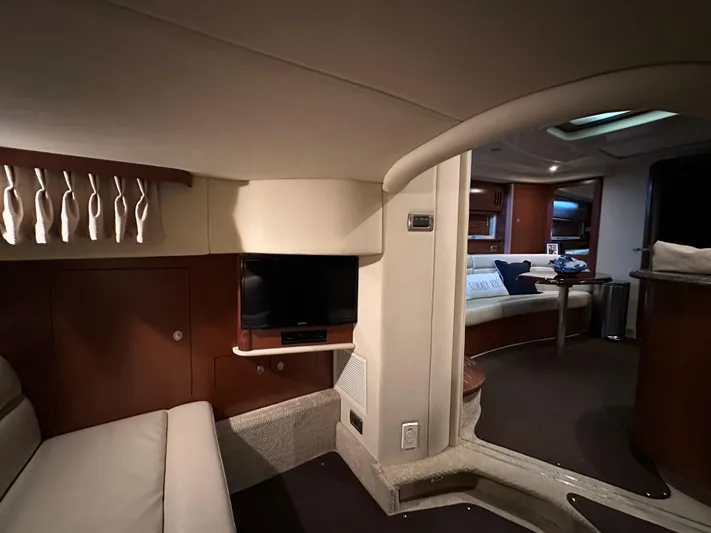  Yacht Photos Pics Luxurious interior of 2007 Sea Ray 44 Sundancer yacht with cozy seating and TV.