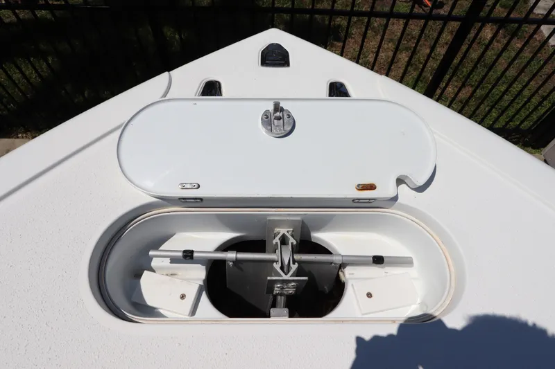  Yacht Photos Pics Bow anchor compartment of 2013 Yellowfin 32 Offshore boat, featuring a closed hatch.