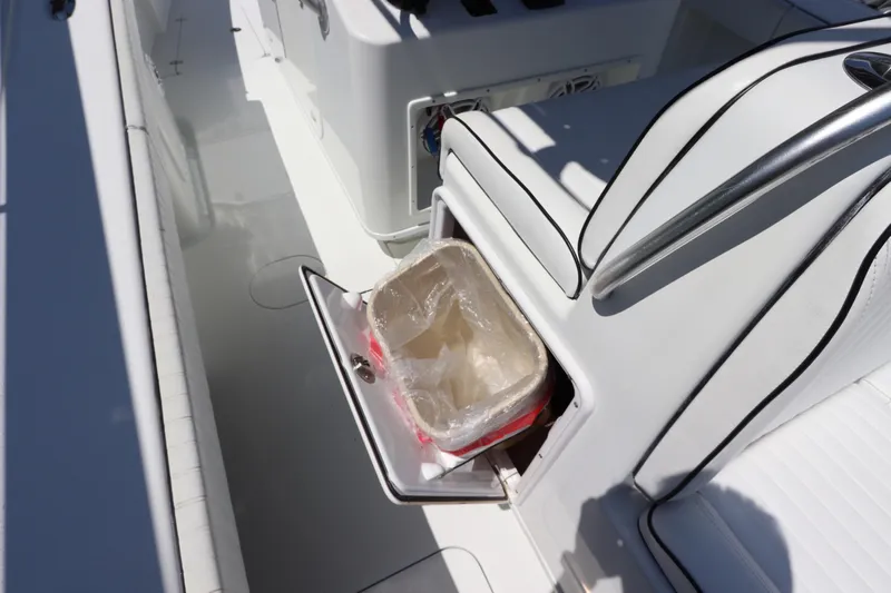  Yacht Photos Pics 2013 Yellowfin 32 Offshore boat interior with open storage compartment.