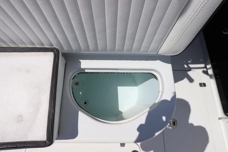  Yacht Photos Pics Livewell on 2013 Yellowfin 32 Offshore boat, featuring cushioned seating.