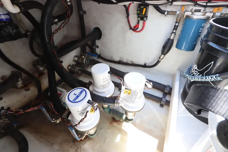  Yacht Photos Pics Engine compartment of 2013 Yellowfin 32 Offshore boat with filters and wiring.