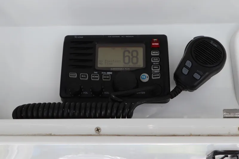  Yacht Photos Pics VHF marine radio on 2013 Yellowfin 32 Offshore boat dashboard.