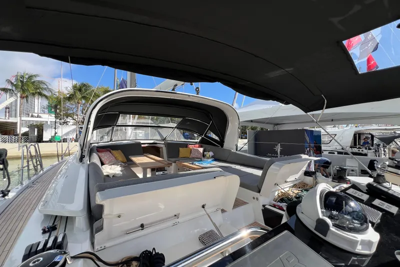  Yacht Photos Pics Luxurious 2023 Jeanneau 65 yacht interior with spacious seating and modern amenities.