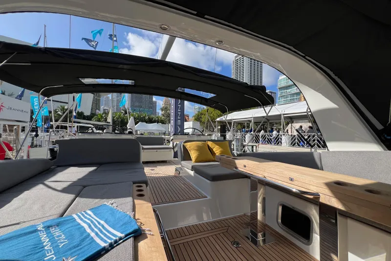  Yacht Photos Pics Luxurious 2023 Jeanneau 65 yacht interior with modern seating and elegant design.