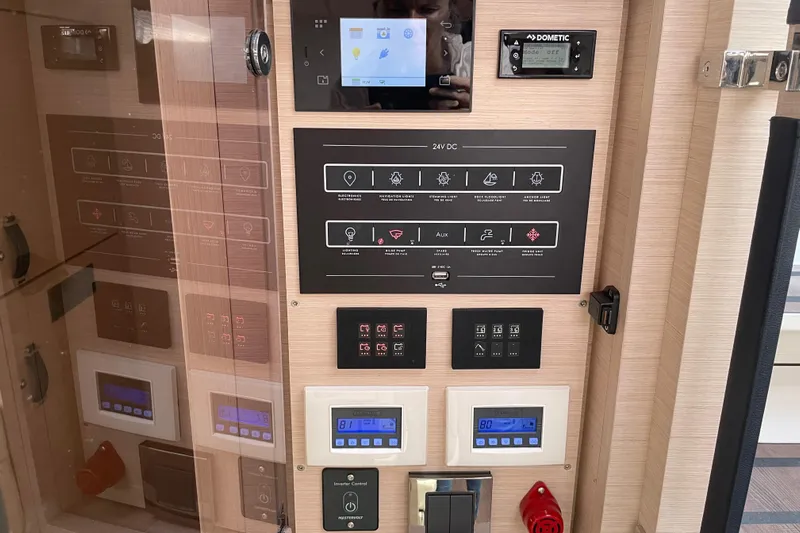  Yacht Photos Pics Control panel of 2023 Jeanneau 65 yacht, featuring various electronic and system controls.
