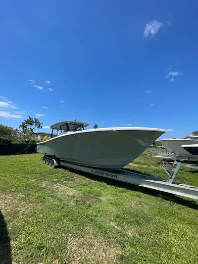  Yacht Photos Pics 2026 Streamline 45 boat on trailer under clear blue sky.