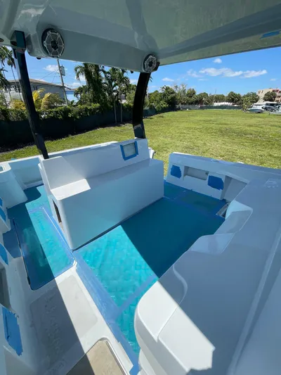  Yacht Photos Pics Interior of 2026 Streamline 45 boat with modern seating and blue accents.