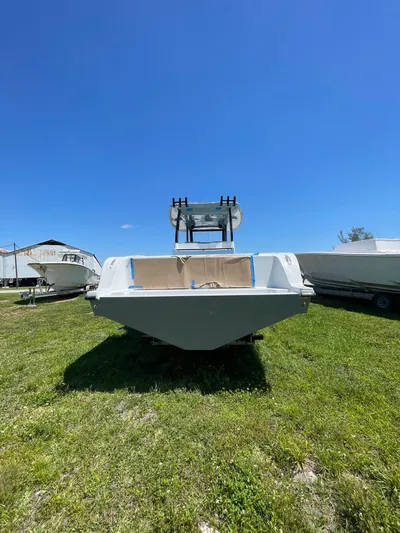  Yacht Photos Pics 2026 Streamline 45 boat on grass under clear blue sky.