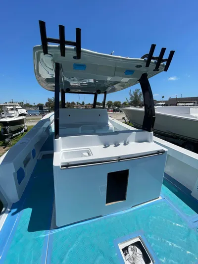  Yacht Photos Pics 2026 Streamline 45 boat with sleek design and spacious deck under clear blue sky.