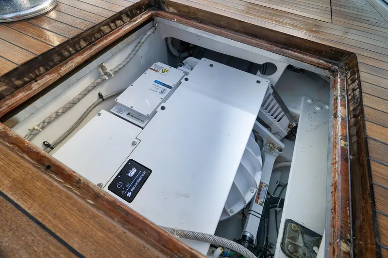  Yacht Photos Pics Engine compartment of a 1997 Garlington 61 yacht, showcasing mechanical components.