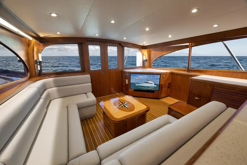  Yacht Photos Pics Luxurious 1997 Garlington 61 yacht interior with elegant wood finish and ocean view.