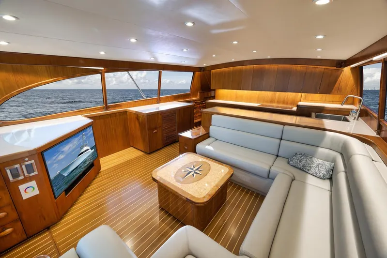  Yacht Photos Pics Luxurious 1997 Garlington 61 yacht interior with elegant wood finish and ocean view.