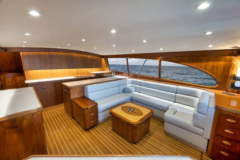  Yacht Photos Pics Luxurious 1997 Garlington 61 yacht interior with elegant wood finishes and spacious seating.