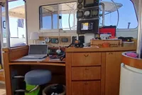 Interior of 2001 Catamaran NIMBLE 50 with navigation equipment and workspace.