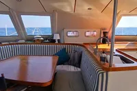 Interior of 2001 Catamaran NIMBLE 50 with ocean view through large windows.