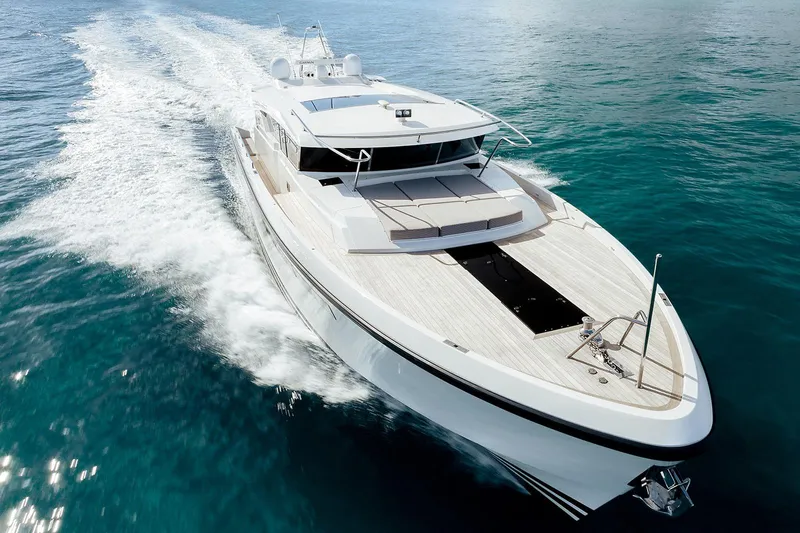 Freya Yacht Photos Pics 2023 Delta Powerboats 54 IPS cruising on open water, showcasing sleek design and luxury.