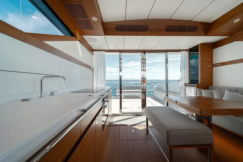 Freya Yacht Photos Pics Luxurious interior of 2023 Delta Powerboats 54 IPS with ocean view and modern design.