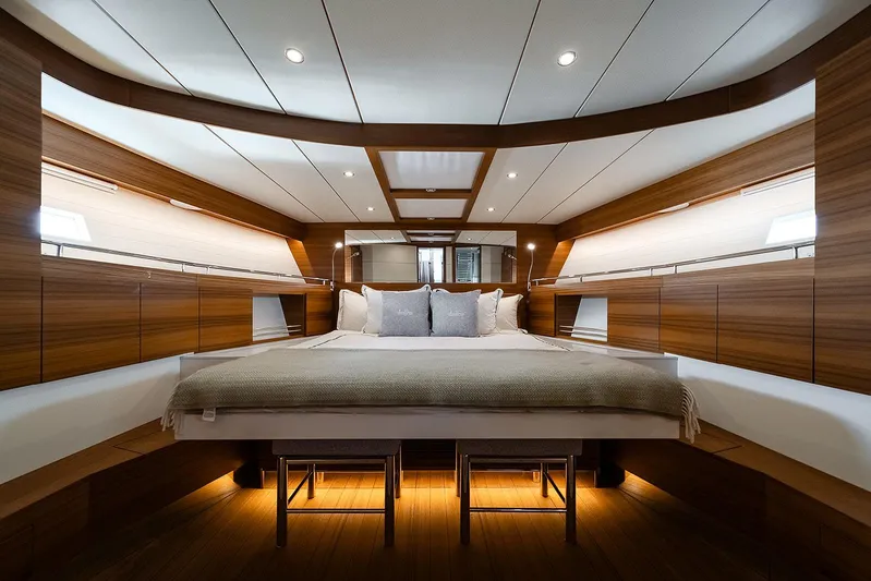 Freya Yacht Photos Pics Luxurious interior of 2023 Delta Powerboats 54 IPS, featuring elegant wood finishes and modern lighting.