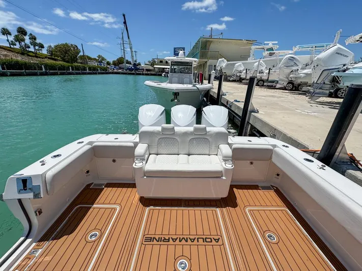 Aquamarine Yacht Photos Pics 2019 HCB 39 Speciale boat with teak deck at marina.