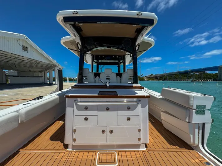 Aquamarine Yacht Photos Pics 2019 HCB 39 Speciale boat with teak deck and sleek design at marina.