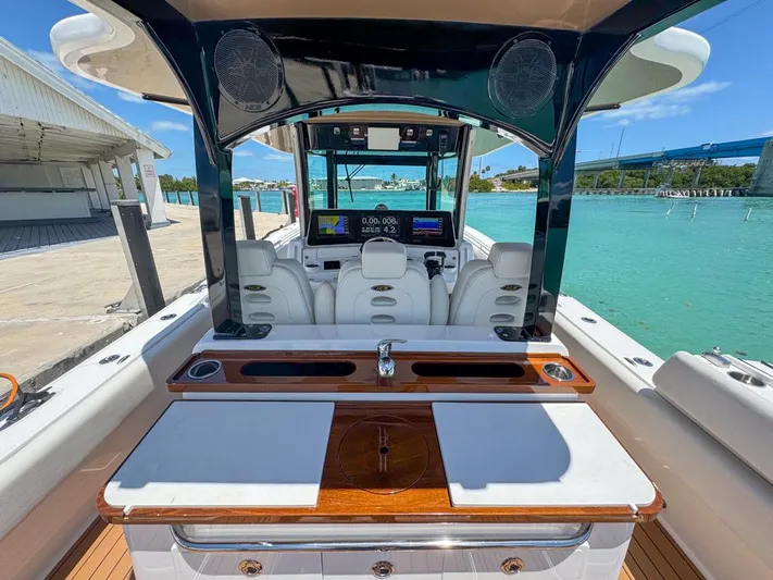 Aquamarine Yacht Photos Pics 2019 HCB 39 Speciale boat interior with luxurious seating and modern dashboard.