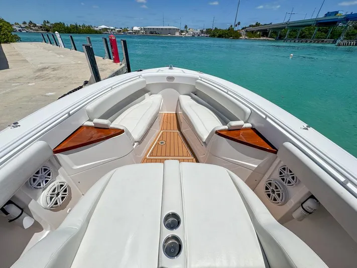 Aquamarine Yacht Photos Pics 2019 HCB 39 Speciale boat interior with white seating and wooden accents.