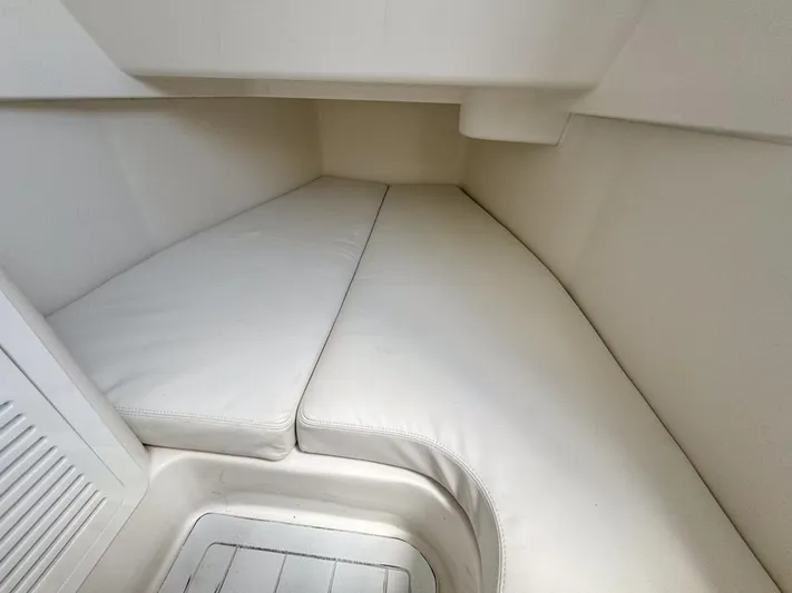 Aquamarine Yacht Photos Pics Interior cabin of 2019 HCB 39 Speciale with white cushioned seating.
