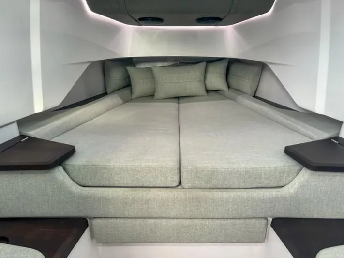  Yacht Photos Pics Luxurious cabin interior of 2024 Axopar 37XC CROSS CABIN with plush bedding.