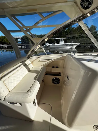 None Yacht Photos Pics 2022 Grady-White Freedom 325 boat interior with luxurious seating and sleek design.