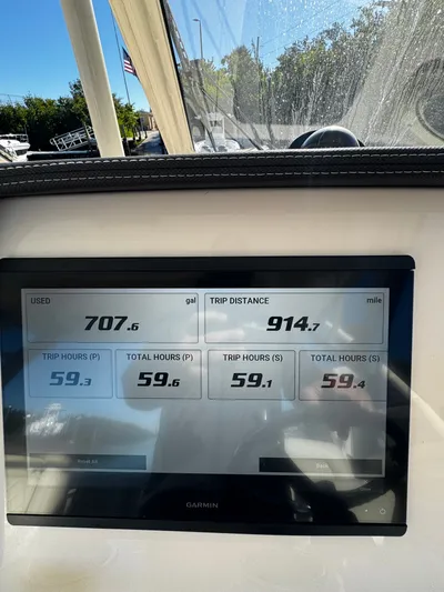 None Yacht Photos Pics Dashboard of a 2022 Grady-White Freedom 325 showing trip data and fuel usage.