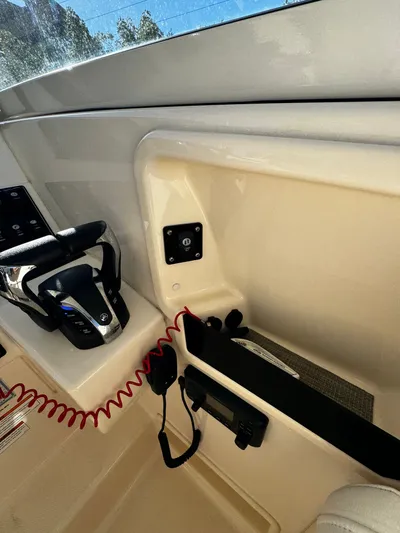 None Yacht Photos Pics 2022 Grady-White Freedom 325 boat interior with steering controls and dashboard.